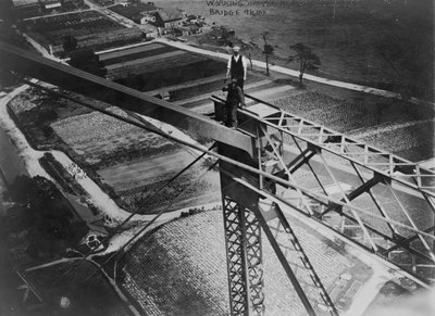 Working on top of Blackwells Island bridge, 1907 by American Photographer